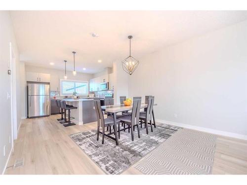 831 Creekside Boulevard Sw, Calgary, AB - Indoor Photo Showing Dining Room