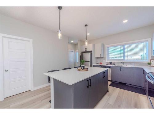 831 Creekside Boulevard Sw, Calgary, AB - Indoor Photo Showing Kitchen With Upgraded Kitchen