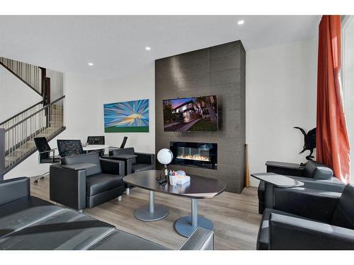 2-1929 36 Street Sw, Calgary, AB - Indoor Photo Showing Living Room With Fireplace