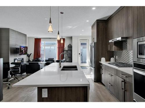 2-1929 36 Street Sw, Calgary, AB - Indoor Photo Showing Kitchen With Double Sink With Upgraded Kitchen