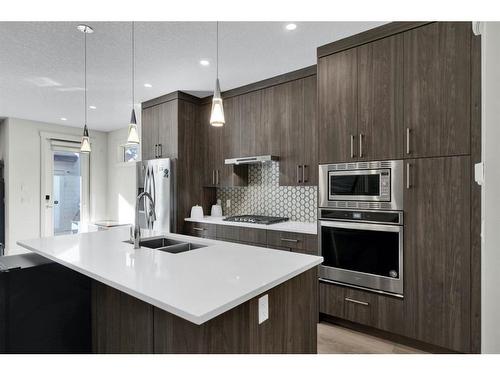 2-1929 36 Street Sw, Calgary, AB - Indoor Photo Showing Kitchen With Double Sink With Upgraded Kitchen