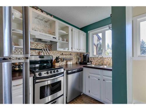 137 Storybook Terrace Nw, Calgary, AB - Indoor Photo Showing Kitchen With Stainless Steel Kitchen With Double Sink