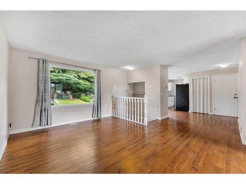 15 Falworth Place Ne, Calgary, AB - Indoor Photo Showing Living Room