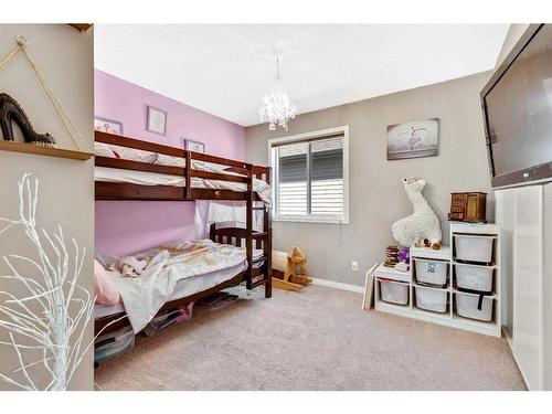 771 Windridge Road Sw, Airdrie, AB - Indoor Photo Showing Bedroom