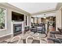 771 Windridge Road Sw, Airdrie, AB  - Indoor Photo Showing Living Room With Fireplace 