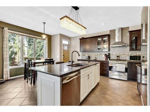 771 Windridge Road Sw, Airdrie, AB - Indoor Photo Showing Kitchen With Double Sink With Upgraded Kitchen