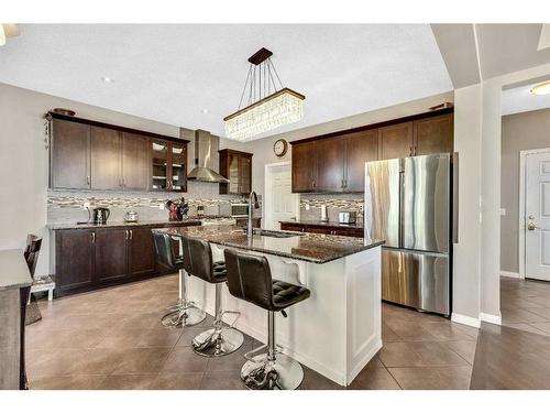 771 Windridge Road Sw, Airdrie, AB - Indoor Photo Showing Kitchen With Upgraded Kitchen