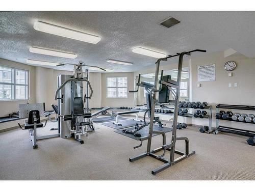 907-1121 6 Avenue Sw, Calgary, AB - Indoor Photo Showing Gym Room