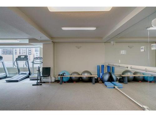 907-1121 6 Avenue Sw, Calgary, AB - Indoor Photo Showing Gym Room