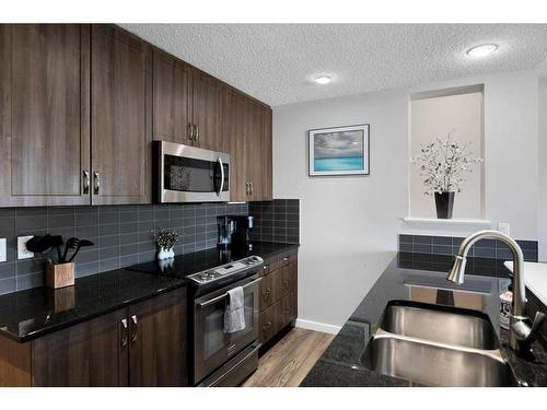 285 Auburn Crest Way Se, Calgary, AB - Indoor Photo Showing Kitchen With Double Sink With Upgraded Kitchen