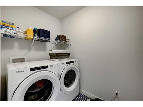 60 Morgan Street, Cochrane, AB - Indoor Photo Showing Laundry Room