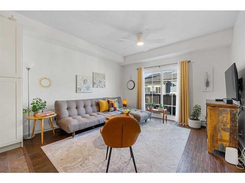 3402-755 Copperpond Boulevard Se, Calgary, AB - Indoor Photo Showing Living Room