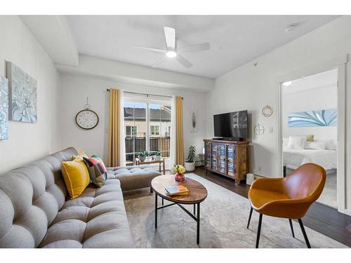 3402-755 Copperpond Boulevard Se, Calgary, AB - Indoor Photo Showing Living Room