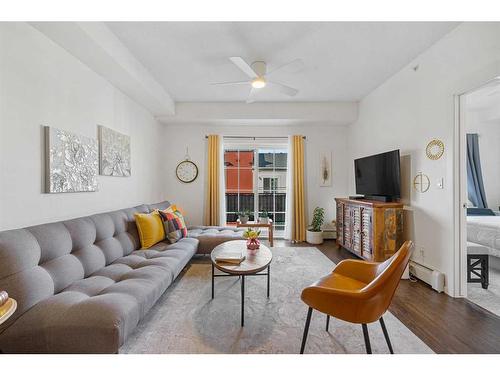 3402-755 Copperpond Boulevard Se, Calgary, AB - Indoor Photo Showing Living Room