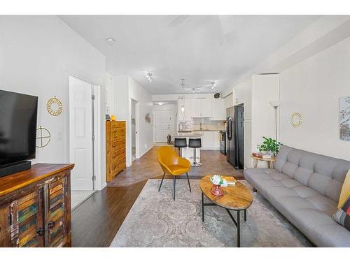 3402-755 Copperpond Boulevard Se, Calgary, AB - Indoor Photo Showing Living Room