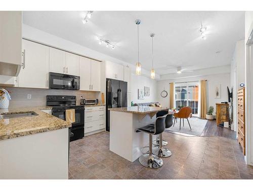 3402-755 Copperpond Boulevard Se, Calgary, AB - Indoor Photo Showing Kitchen With Upgraded Kitchen