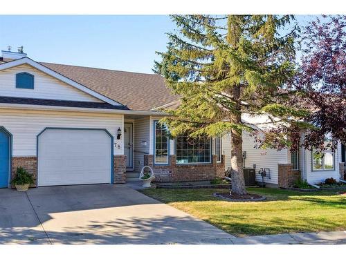 78 Rivercrest Villas Se, Calgary, AB - Outdoor With Facade