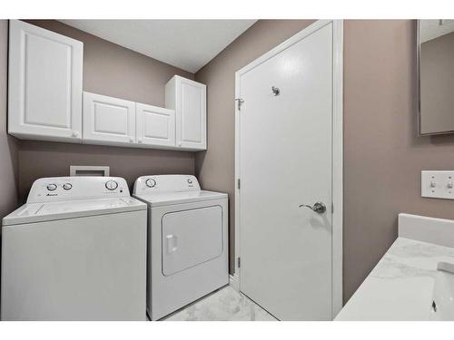 78 Rivercrest Villas Se, Calgary, AB - Indoor Photo Showing Laundry Room