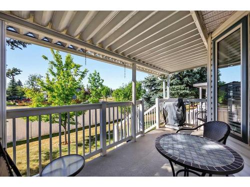 78 Rivercrest Villas Se, Calgary, AB - Outdoor With Deck Patio Veranda With Exterior