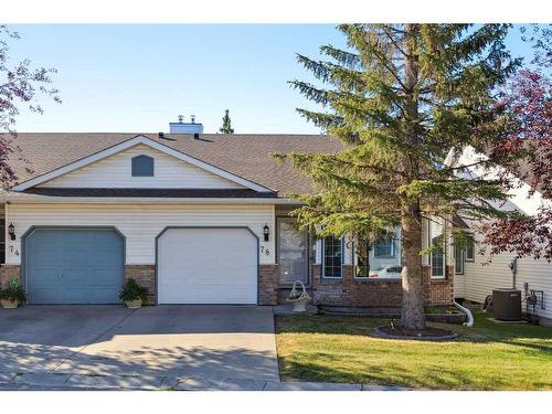 78 Rivercrest Villas Se, Calgary, AB - Outdoor With Facade