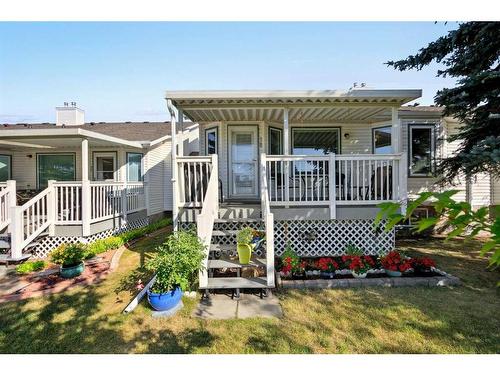 78 Rivercrest Villas Se, Calgary, AB - Outdoor With Deck Patio Veranda