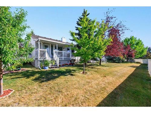 78 Rivercrest Villas Se, Calgary, AB - Outdoor With Deck Patio Veranda