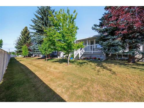 78 Rivercrest Villas Se, Calgary, AB - Outdoor With Deck Patio Veranda