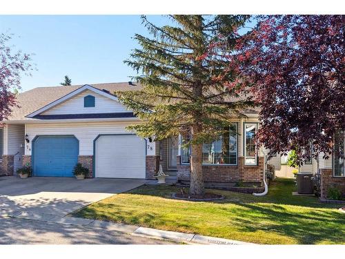 78 Rivercrest Villas Se, Calgary, AB - Outdoor With Facade