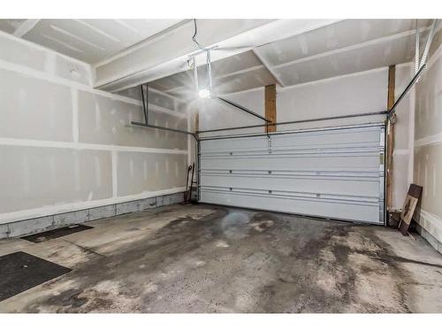 128 Cityside Manor Ne, Calgary, AB - Indoor Photo Showing Garage