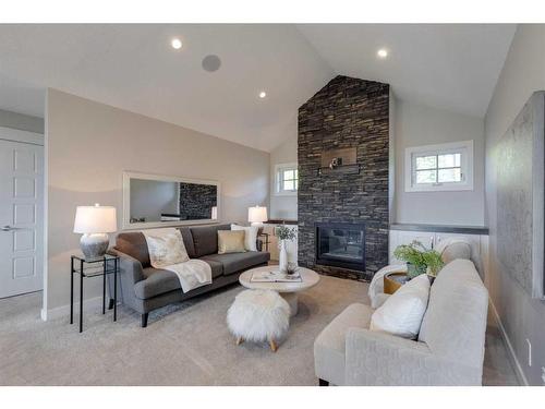 118 Hillside Terrace, Rural Rocky View County, AB - Indoor Photo Showing Living Room With Fireplace