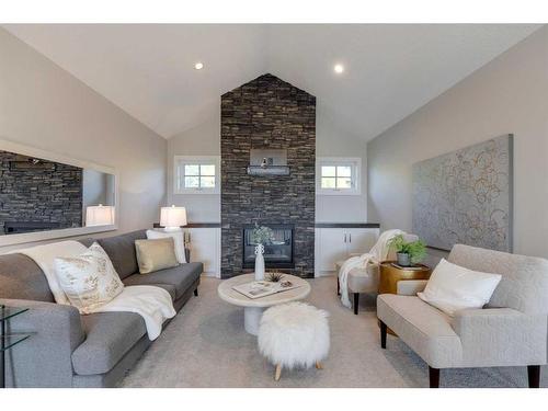 118 Hillside Terrace, Rural Rocky View County, AB - Indoor Photo Showing Living Room With Fireplace