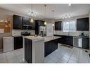 108 Skyview Springs Manor Ne, Calgary, AB  - Indoor Photo Showing Kitchen With Stainless Steel Kitchen With Double Sink 