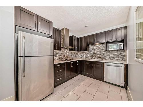 1716 32 Street Sw, Calgary, AB - Indoor Photo Showing Kitchen With Upgraded Kitchen