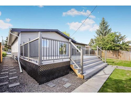 10604 Oakmoor Way Sw, Calgary, AB - Outdoor With Deck Patio Veranda With Exterior