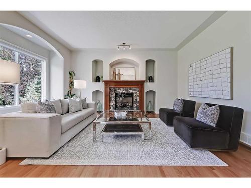 133 Tusslewood Heights Nw, Calgary, AB - Indoor Photo Showing Living Room With Fireplace