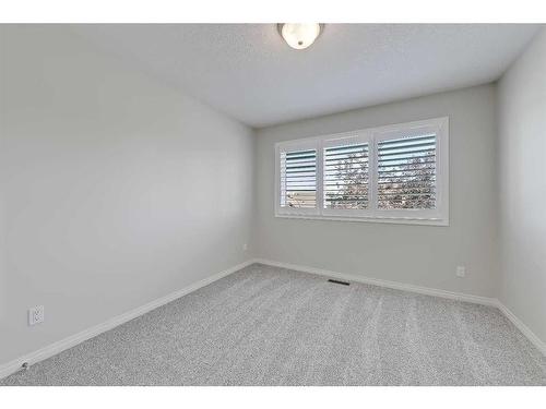 133 Tusslewood Heights Nw, Calgary, AB - Indoor Photo Showing Other Room