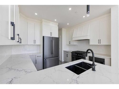 492 Muirfield Crescent, Lyalta, AB - Indoor Photo Showing Kitchen With Double Sink With Upgraded Kitchen