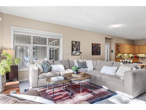 102-3 Aspen Glen, Canmore, AB - Indoor Photo Showing Living Room