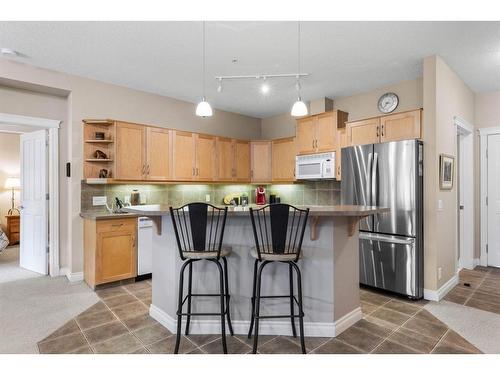 102-3 Aspen Glen, Canmore, AB - Indoor Photo Showing Kitchen