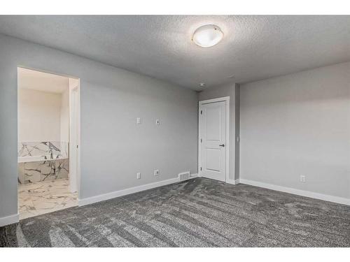 158 Aquila Way Nw, Calgary, AB - Indoor Photo Showing Other Room