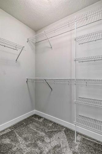 158 Aquila Way Nw, Calgary, AB - Indoor With Storage