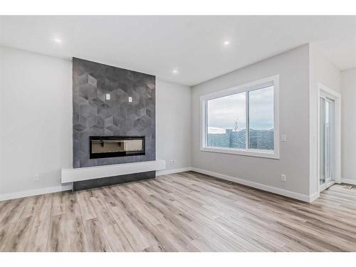 158 Aquila Way Nw, Calgary, AB - Indoor Photo Showing Living Room With Fireplace