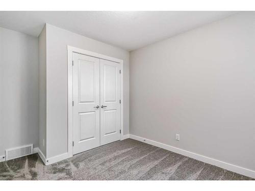 158 Aquila Way Nw, Calgary, AB - Indoor Photo Showing Other Room