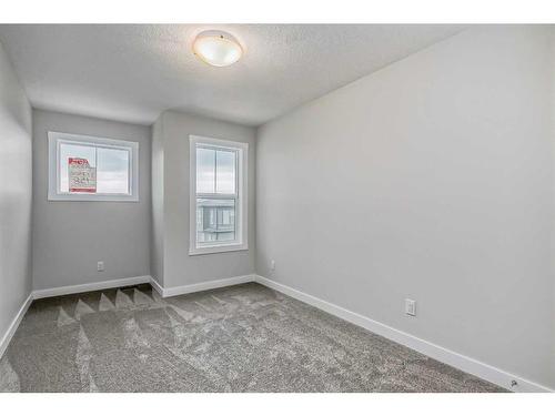 158 Aquila Way Nw, Calgary, AB - Indoor Photo Showing Other Room