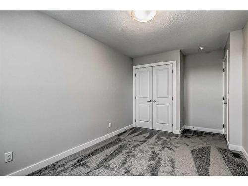 158 Aquila Way Nw, Calgary, AB - Indoor Photo Showing Other Room