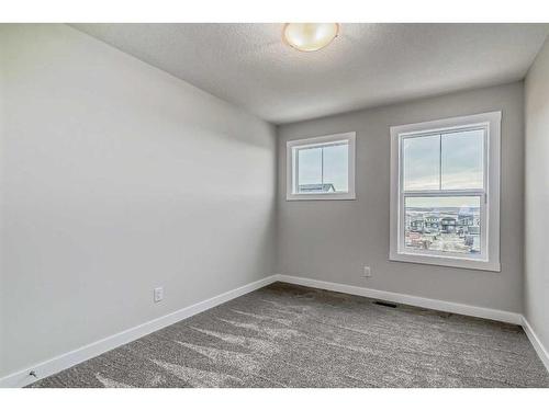 158 Aquila Way Nw, Calgary, AB - Indoor Photo Showing Other Room