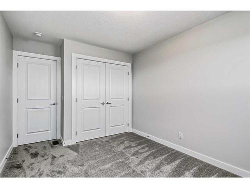 158 Aquila Way Nw, Calgary, AB - Indoor Photo Showing Other Room