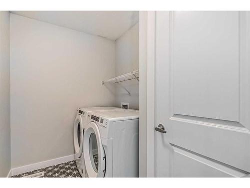 158 Aquila Way Nw, Calgary, AB - Indoor Photo Showing Laundry Room