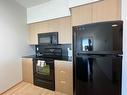 1513-8880 Horton Road Sw, Calgary, AB  - Indoor Photo Showing Kitchen 