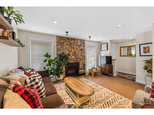 4058 46 Street Sw, Calgary, AB - Indoor Photo Showing Living Room With Fireplace